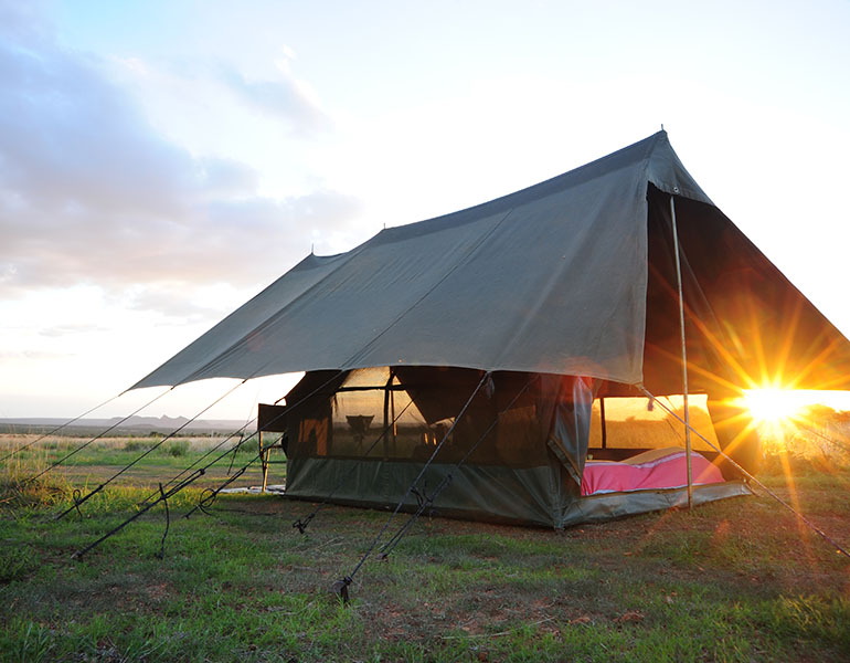 Karisia Walking Safaris Luxury Walking Safari Guest Tent Exterior Dusk